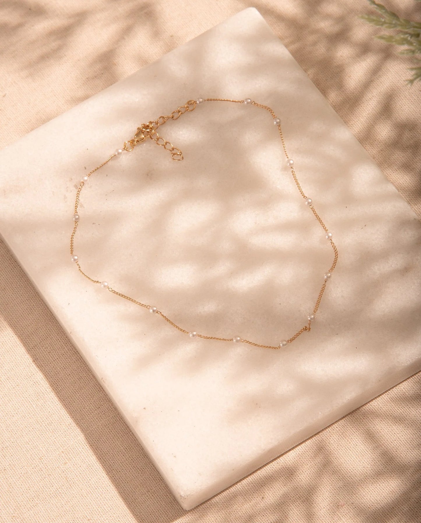 Perlenhalsband + Ohrringe